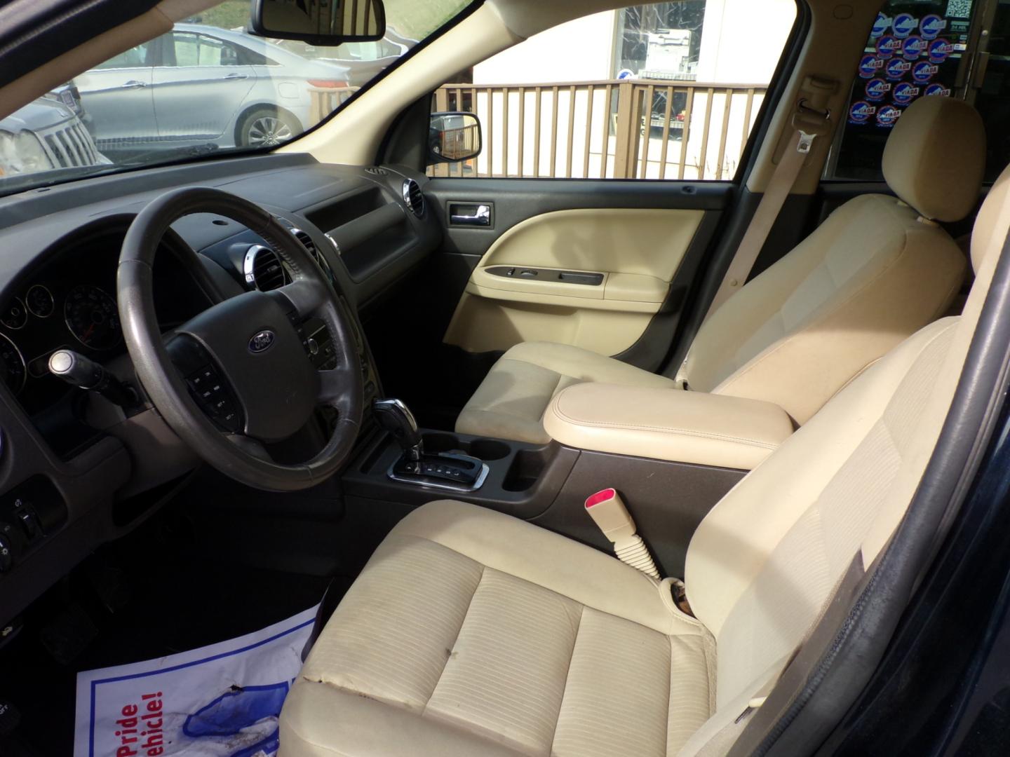 2008 Blue Ford Taurus X SEL FWD (1FMDK02W18G) with an 3.5L V6 DOHC 24V engine, 6-Speed Automatic Overdrive transmission, located at 5700 Curlew Drive, Norfolk, VA, 23502, (757) 455-6330, 36.841885, -76.209412 - Photo#4